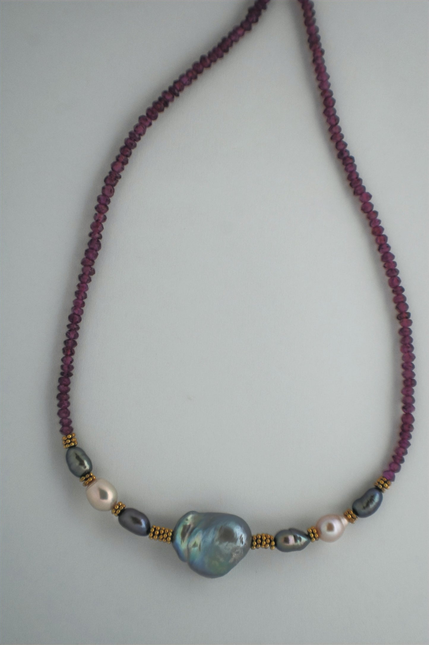 baroque pearl strung with garnet